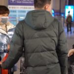 Virus cinese, Cinesi con mascherine a Wuhan