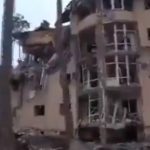 Paese del bianco e nero, Palazzo distrutto dai bombardamenti russi in Ucraina