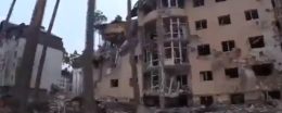 Paese del bianco e nero, Palazzo distrutto dai bombardamenti russi in Ucraina