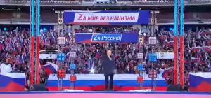  Marina Ovsyannikova, Vladimir Putin parla ai suoi sostenitori nello stadio Luzniki